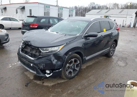 2019 Honda Cr-V Touring z USA, uszkodzony, nr VIN 5J6RW2H99KL016679